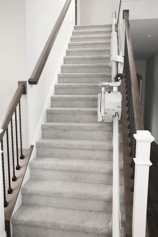 /content/image/Products/Stairlifts/Bruno Elan Stairlift/bruno-elan-folded-on-stairs.webp
